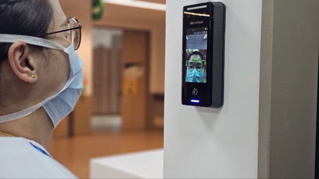Women using the Facial Recognition Attendance system 